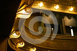counter lamps and friezes in the Tivoli theater room in Lisbon.