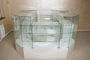 Counter for retail sale of goods in a store made of glass and wooden panels. Equipment forsale of products. concept is business