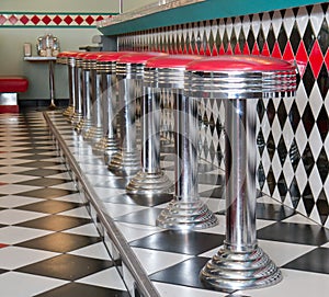 Counter Stools in a row at a 50's style diner