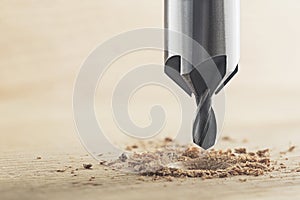 Countersink drill bit make sink in hole for screw in wooden oak plank