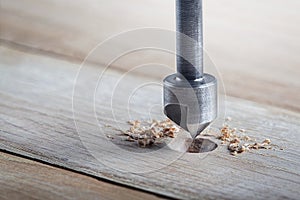 Countersink drill bit make sink in hole for screw in wooden plank