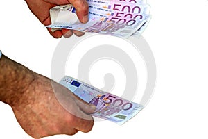 Counting 500 Euro Banknotes on White Background