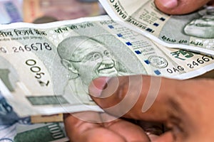 Counting Indian rupee currency,money