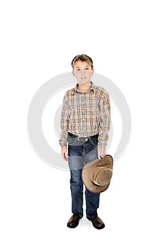 Country boy holding hat