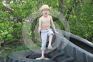 Country boy on large tires