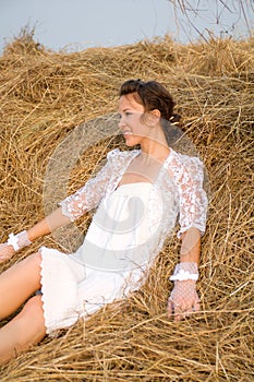 Country bride on haystack