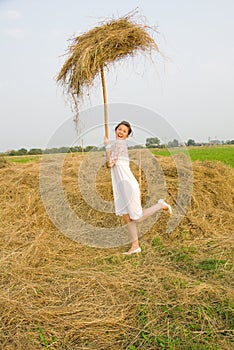 Country bride on haystack
