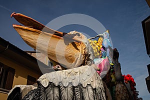 Country of Cento, Italy colorful floats parade through the streets. `Pelican, wings, flight` theme,