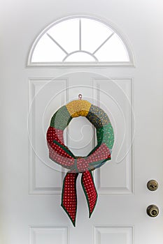 Country Christmas Wreath Hanging on White Door