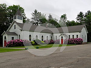 Country Church With Spring Flowers