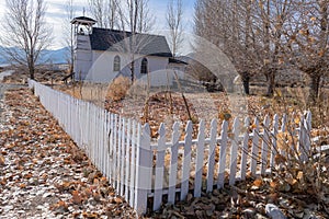 Country church and a white picket fence