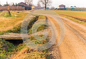 Country dirt road and ditch