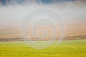 Country field fog landscape on autumn day