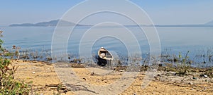 A country fishing boat anchored in river Mahanadi in Rampaluga picnic spot of Odisha.