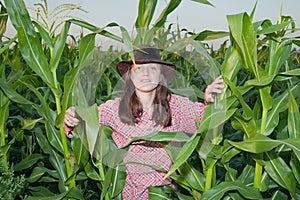 Country girl in corn field