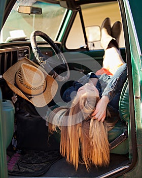 Country girl in old truck