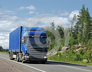 Country highway and blue truck