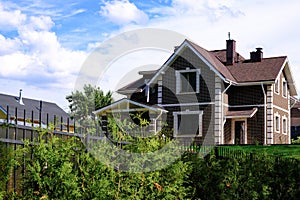 Country house. Beautiful summer cottage greenery in the garden