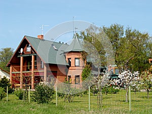 Country house and blossoming garden