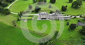 Country house or suburban residence against the backdrop of a green park