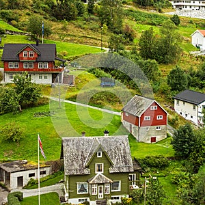 Country houses in green village Olden in Norway