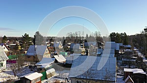 Country houses in village on a sunny winter day