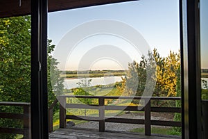Country idyll, view from a patio, landscape with a river