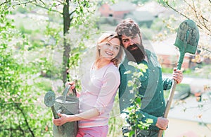 Country life. I like spending time on farm. Eco living. Farmers couple working in field. Portrait of pair of farms