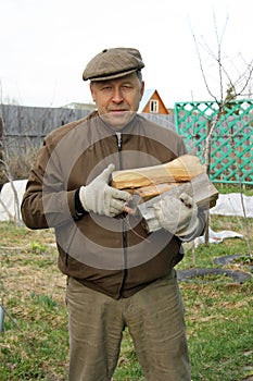 Country man with firewood