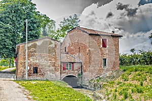 Country mill along dry river