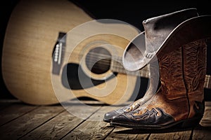 Country music festival live concert with acoustic guitar, cowboy hat and boots