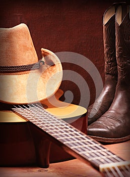 Country music with guitar and cowboy clothes