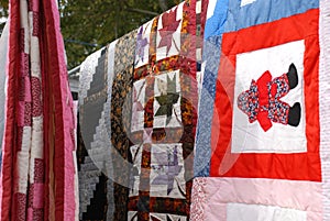 Country Quilts hanging