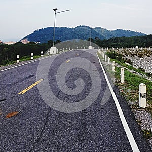 Country road against mountain