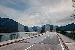 Country road along Faller Klamm Bridge across Lake Sylvenstein