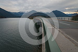 Country road along Faller Klamm Bridge across Lake Sylvenstein