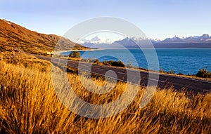 Country Road With Amazing Scenery Of Lake