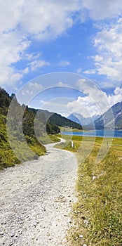 Country road around Sils Lake on upper Engadine Valley Switzerland - Europe - image with copy space