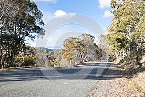 Country road being divided by landscape slope