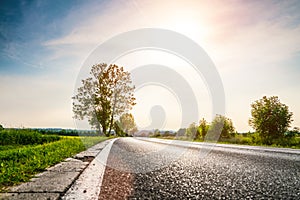 Country road with broken curb