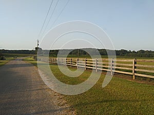 Country road with a fence