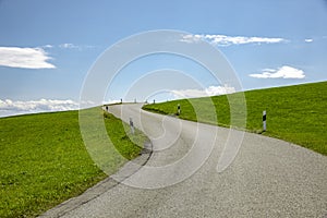 Country road in a hilly landscape