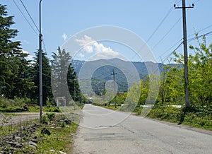 Country road leading to the mountains. Roadway Asphalt road in a beautiful location