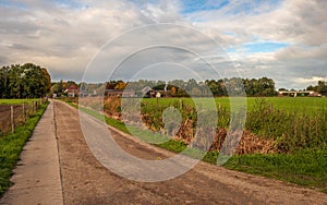 Country road in the outskirts of a Dutch village