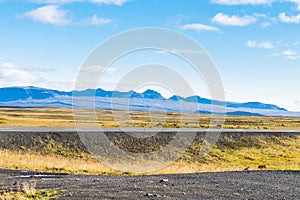 Country road and roadside in Iceland in sunny day