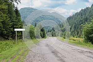 Country road between small settlements in the Carpathians