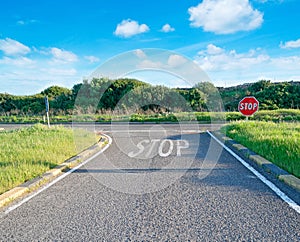 Country road with stop sign