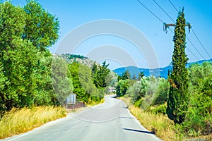 Country road at summer scenery Kefalonia island Ionian Sea Greece