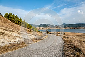 Country road towards the lake in Navarra, Spain