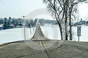 Country Road in the Winter Speed Limit Sign